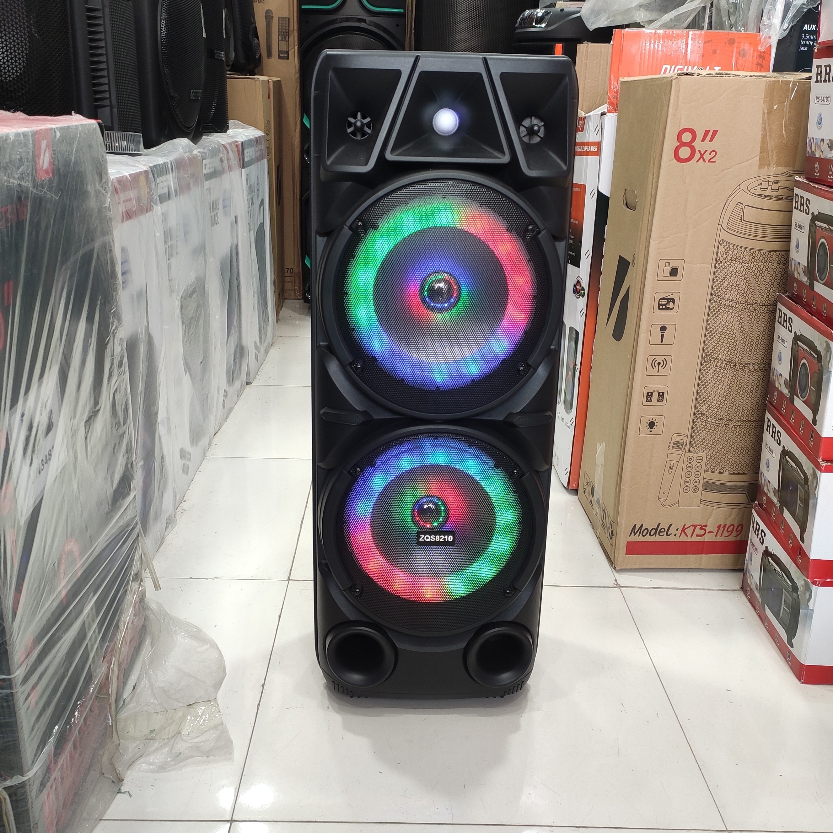 اسپیکر بلوتوثی ZQS 8210 اصلی بهمراه میکروفون بی سیم و کنترل کیفیت عالی